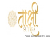 The image is a logo for a company called "SUTRA". The logo is written in a traditional Indian calligraphy style, with the wor...