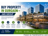 The image is an advertisement for JMS Group's property in Gurgaon, India. The background of the image is a cityscape with tal...
