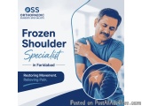 The image is an advertisement for Orthopaedic Surgery Specialists in Faridabad, India. It features a man holding his shoulder...
