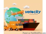 The image is an illustration of a cargo ship with a yellow truck and a scooter next to it. The truck is a delivery truck with...