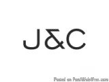 The image is a black and white logo of the brand J&C. The logo consists of the letters "J" and "C" in a bold, sans-serif font...