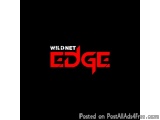 The image is a black background with the text "Wild Net Edge" written in red capital letters. The text is in a bold, sans-ser...