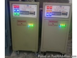 The image shows two large industrial machines, labeled "Lazer" and "DANGER", which are used to control the voltage and curren...