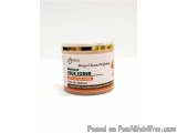 The image is of a jar of Deep Clean Prifying Face Scrub. The jar is white with a gold lid and has a label on it. The label ha...