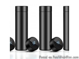 The image shows a group of four black cylindrical devices with round caps. The devices are arranged in a row, with three on t...