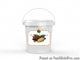 The image is of a white plastic bucket with a handle. The bucket has a label on it that reads "Beurre de Cacao" in a cursive...