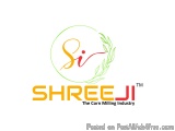 The image is a logo for Shreeji, a corn milling industry. The logo is circular in shape and has a green and yellow color sche...