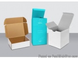 The image shows three cardboard boxes of different sizes and shapes. On the left, there is a brown cardboard box with a lid t...