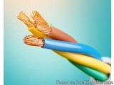 The image shows a close-up of a bunch of electrical wires. The wires are of different colors - blue, yellow, and orange - and...