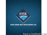 The image is a logo for ASSK Amari Way Developers Ltd. The logo is a diamond-shaped diamond with the word "ASSK" written in w...