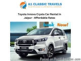 The image is an advertisement for Toyota Innova Crysta Car Rental in Jaipur, India. The car is a silver SUV with a sleek and...
