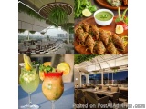 The image is a collage of four different pictures of different types of food and drinks in a restaurant. The first picture on...