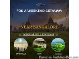 The image is an advertisement for a weekend getaway in Near Bangalore, India. The background of the image is a beautiful land...