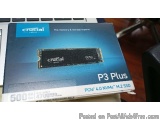 The image shows a Crucial P3 Plus PCIE 4.0 NVMe M.2 SSD, which is a high-speed memory card. The card is blue and white in col...