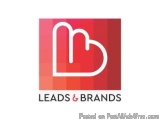 The image is a logo for a company called "LEADS & BRANDS". The logo is rectangular in shape and has a red background with a d...