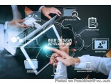 The image is a digital illustration that represents web design development. It shows a group of people working together on a...