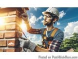 The image shows a construction worker wearing a hard hat, safety harness, and gloves. He is working on a brick wall with a ha...
