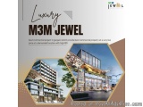 The image is an advertisement for a luxury M3M Jewel, a commercial project in Gurgaon, India. The advertisement is promoting...