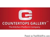 The image is a logo for Countertops Gallery, a kitchen platform company. The logo is rectangular in shape and has a red backg...