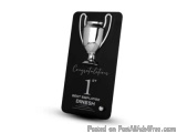 The image is a black rectangular card with a silver trophy on it. The trophy is in the shape of a cup with two handles on eit...