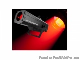 The image shows a black LED floodlight with a red and orange light emanating from it. The floodlight is mounted on a black ba...
