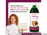 The image is an advertisement for Sushain Lady Care Juice. It features a young woman with red curly hair, wearing a white tur...