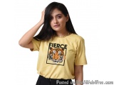 The image is of a young woman wearing a yellow t-shirt with a graphic design on the front. The design features a tiger's face...