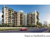 The image is a 3D rendering of a modern apartment building. The building is made up of multiple floors and has a flat roof. T...