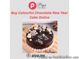 The image is an advertisement for a chocolate New Year cake. The cake is on a wooden cutting board and is decorated with whit...