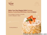 The image is an advertisement for a birthday cake in Indore, India. The background is a light beige color and the text is wri...