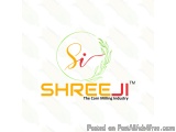 The image is a logo for a company called Shreeji. The logo is circular in shape and has a green and yellow color scheme. In t...