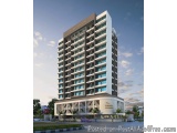 The image is a 3D rendering of a modern apartment building. The building is tall and has a flat roof with multiple floors. Th...