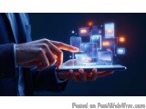 The image shows a hand holding a tablet with multiple mobile devices on it. The devices are arranged in a grid-like pattern,...