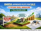 The image is an advertisement for a real estate project in Mysore Road, Bangalore. The background of the image shows a beauti...