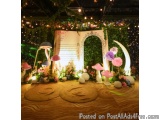 The image is of a beautiful and whimsical display in a room decorated with fairy-themed decorations. The focal point of the d...