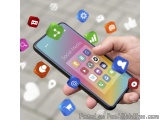 The image shows a hand holding a smartphone with the screen displaying the social media app. The phone is black and the scree...