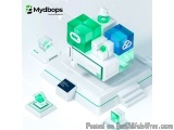 The image is an illustration of a futuristic-looking machine with multiple cubes on top of it. The machine is white with gree...