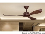 The image shows a ceiling fan in a modern room. The fan is made of wood and has a dark brown finish. It has four blades that...
