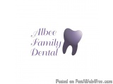 The image is a logo for Albee Family Dental. It has a purple background with the company name written in a cursive font in th...