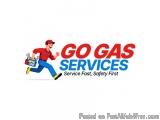 The image is a logo for a company called "GO GAS SERVICES". The logo features a cartoon illustration of a man wearing a red u...