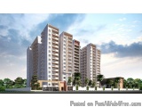 The image is a 3D rendering of a modern apartment building. The building is tall and has multiple floors with balconies. It i...