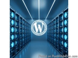The image shows a server room with rows of servers on either side. The servers are arranged in a neat and orderly manner, wit...