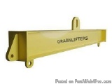 The image shows a yellow-colored metal bracket with the word "GRABNLIFTERS" written on it in black letters. The bracket appea...