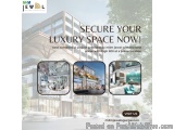 The image is an advertisement for a luxury space project provided by M3M Jewel. The background of the image shows a modern bu...