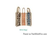 The image shows three wine bags made of jute or burlap. The bags are rectangular in shape and have a handle on top for easy c...