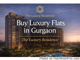 The image shows a beautiful view of a luxurious residential complex in Gurgaon, India. The complex is a tall, modern building...