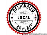 The image is a circular badge or emblem with a red border and a black background. In the center of the badge, there is a whit...