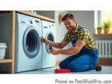 In this image, we can see a young man kneeling on the floor in front of a washing machine in a laundry room. He is wearing a...