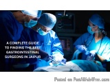 The image shows three surgeons performing an operation in an operating room. They are wearing blue surgical gowns, masks, and...