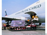 The image shows a Cathay Pacific Cargo airplane parked on the tarmac at an airport. The airplane is white with the airline's...